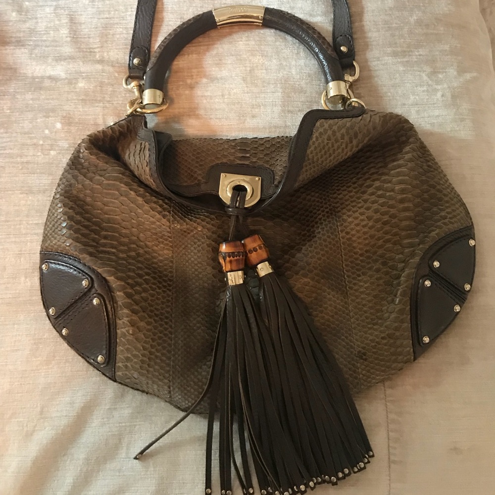 A brown Gucci bag Real Snakeskin